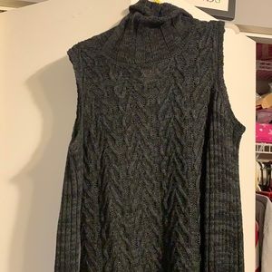 Black turtle neck sweater. Open shoulder. Only worn twice looks brand new